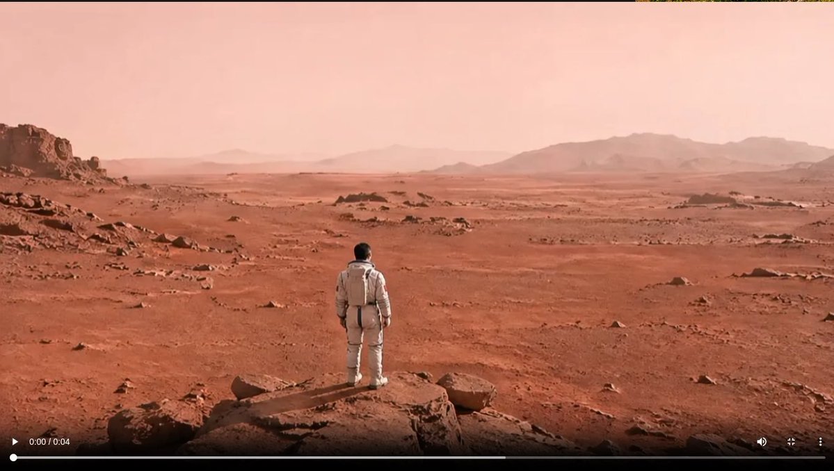 Astronaut on a Red Desert World